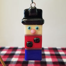 Load image into Gallery viewer, Fused Glass Nutcracker Ornament holiday bauble security guard gift