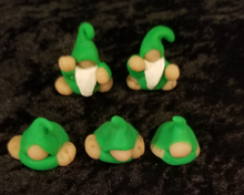 Load image into Gallery viewer, Mini green baby gnomes, polymer clay, not a toy, mini figurine, tomte, gonk, gnomies, each figure is about 1 x 1 x .75 inches big