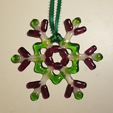 Load image into Gallery viewer, Glass Snowflake Ornament Suncatcher red green winter snow decoration