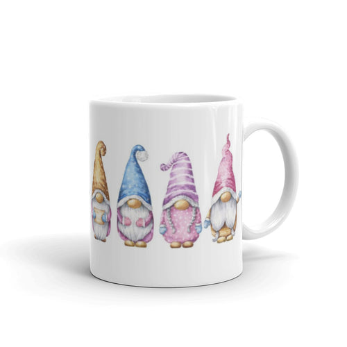 White glossy mug printed with 4 gnome pals in pink, blue, purple and tan outfits, gnome girl, 15 ounce or 18 ounce available