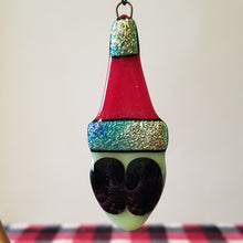 Load image into Gallery viewer, Christmas ornament, Alien Ornament, Alien in a Santa Hat, fused glass extra terrestrial
