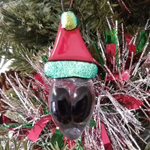 Load image into Gallery viewer, Fused glass Alien in a Santa hat ornament red green holiday bauble
