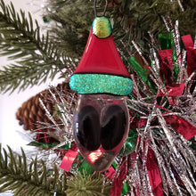 Load image into Gallery viewer, Fused glass Alien in a Santa hat ornament red green holiday bauble
