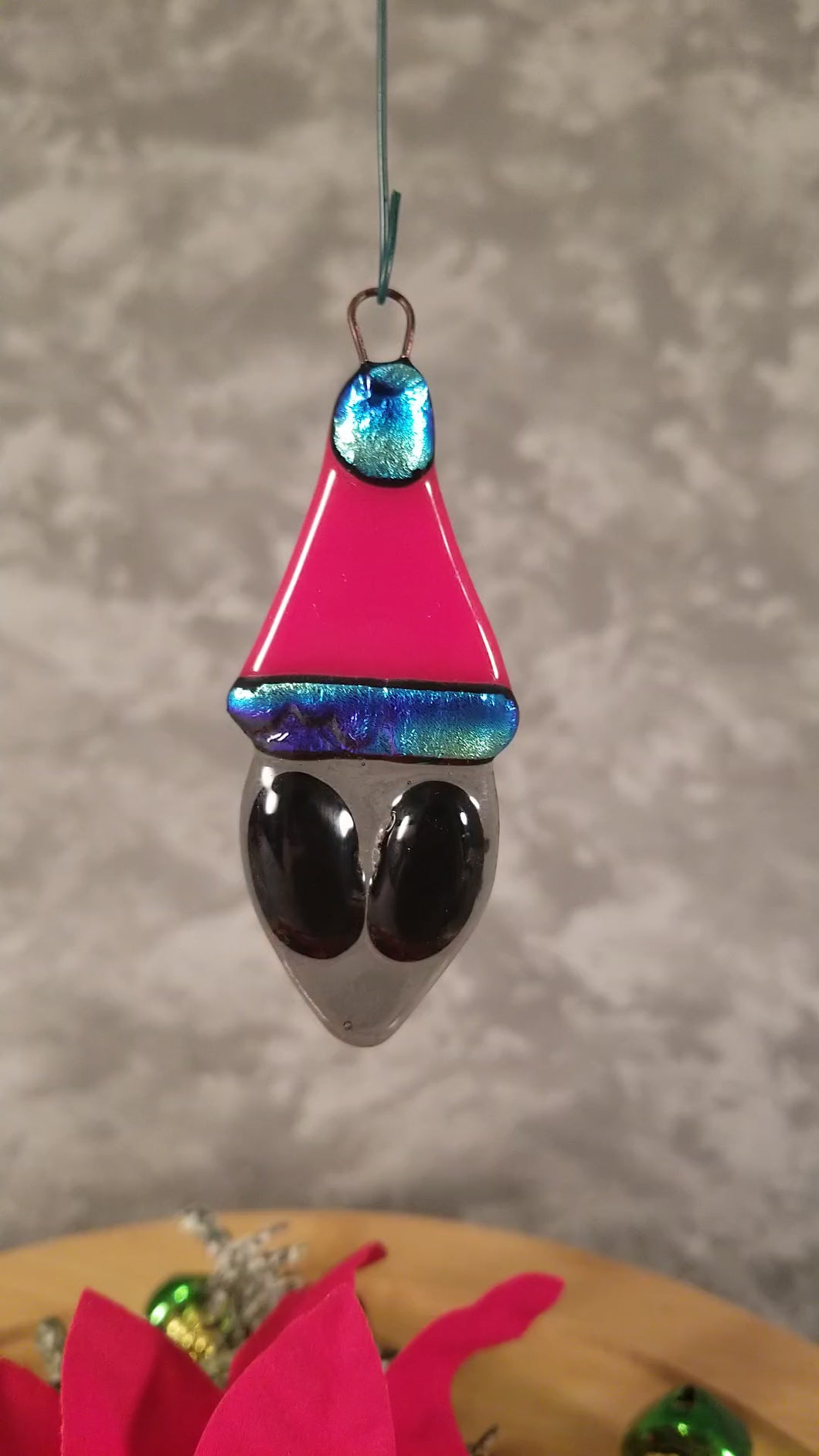 Festive Grey Alien in a Santa Hat fused glass ornament