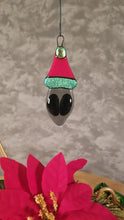 Load and play video in Gallery viewer, Fused glass Alien in a Santa hat ornament red green holiday bauble
