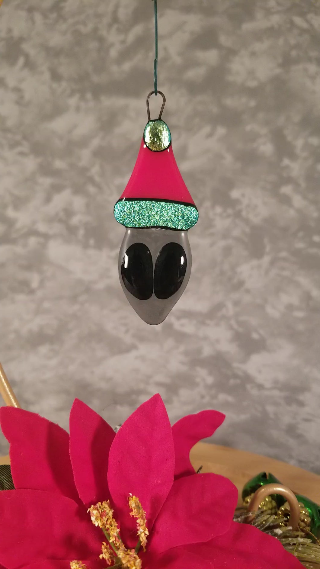 Fused glass Alien in a Santa hat ornament red green holiday bauble